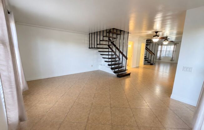 Spacious 3 Bedroom 2 Bathroom Town-Home with In-Unit Laundry, Pool and 2 Parking Spaces!