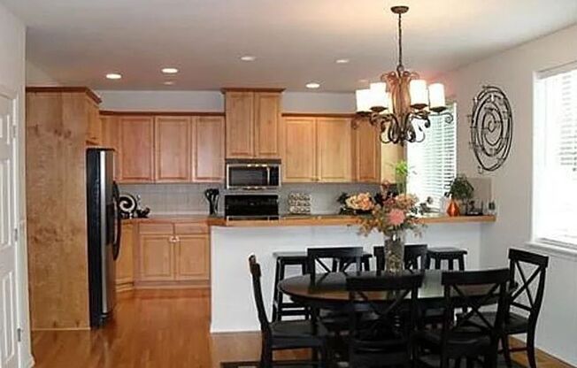 Gorgeous-Hardwoods-Open-Beautiful-Stainless-Granite