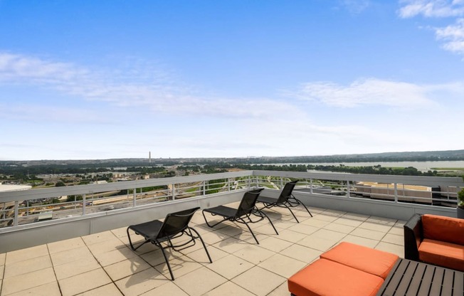 Rooftop deck with lounge chairs at Lenox Club, Virginia, 22202