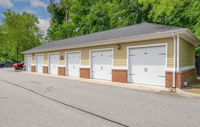 A row of garages available for rent at Fenwyck Manor Apartments in Chesapeake, VA