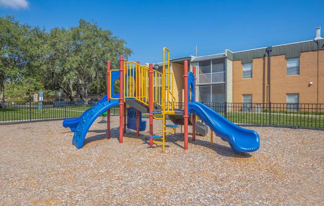 a playground in front of a building