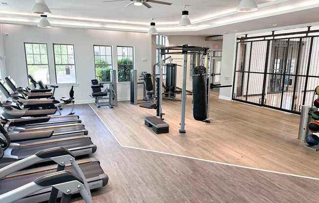 Professional fitness studio with virtual training and yoga/Pilates zone