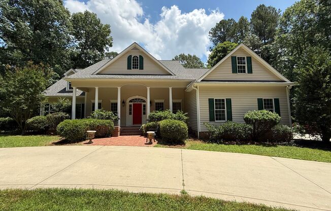Tranquil and Secluded Raleigh Home with Unique Bonus Features Located on a 7+ Acre Lot on a Private Street with Plenty of Privacy and Outdoor Space