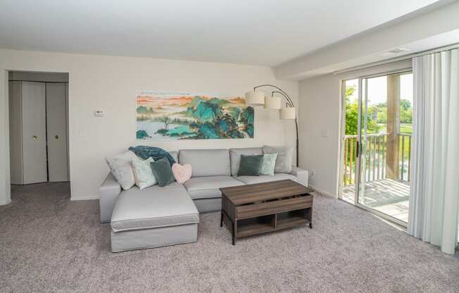 Spacious and cozy living room at Cambridge Club Apartments in Ann Arbor, Michigan