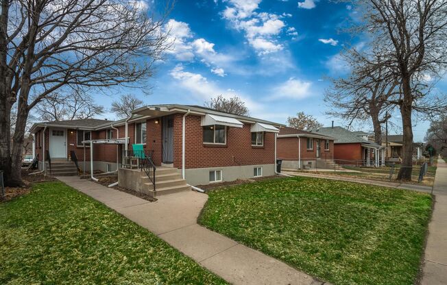 Spacious 4BR with bonus space and a 2 car garage in the heart of Sunnyside!