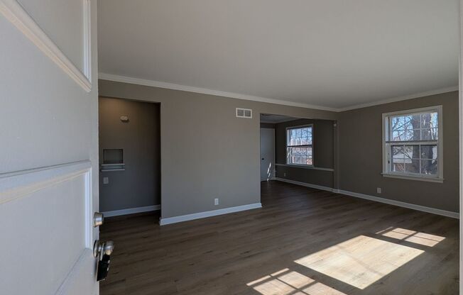 Fully Renovated Home with Sunroom, Garage & Huge Fenced Yard