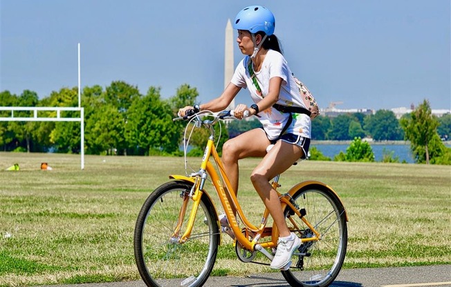 Woman Riding a bike at The Paramount, Arlington