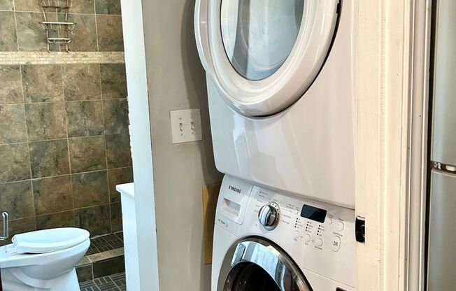 Condo with free heat! In-unit laundry, hardwoods, more!