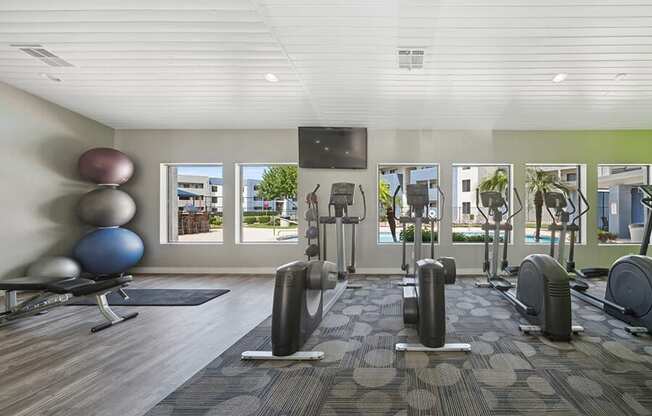 Community Fitness Center with Equipment at Saratoga Ridge Apartments located in North Phoenix, AZ.