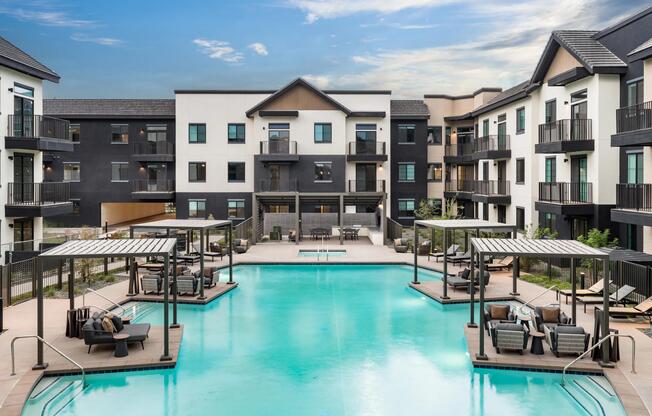 Resort-style pool and spa feature expansive water views, spacious sundecks, and private cabanas designed for elevated outdoor living.
