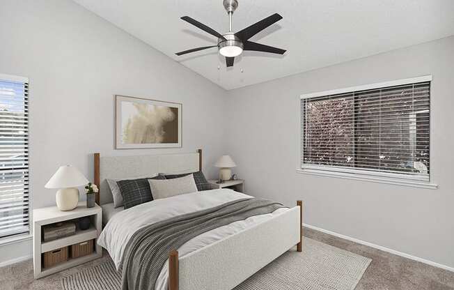 Model Bedroom with Carpet and Window Views at The Meritage Apartments in Vallejo, CA.