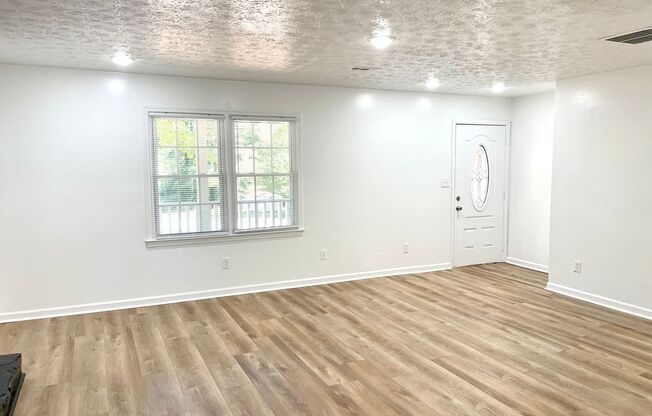 Welcome to this stunning 5-bedroom, 2-bathroom home located in the charming town of Fairburn, GA.