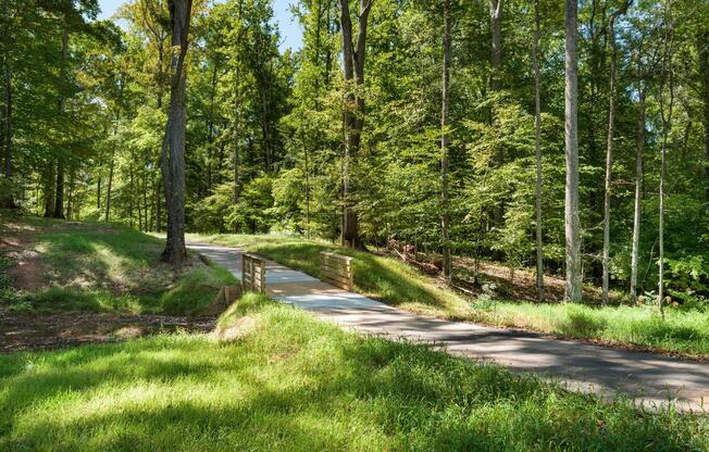 Surrounded by natural beauty, the community offers direct access to scenic walking trails and preserved green space that encourage outdoor recreation and connection to nature.