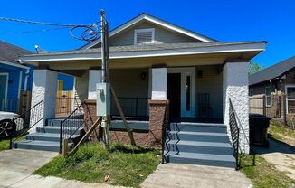 Beautifully remodeled, three bedroom, one bath, single-family home with off-street parking and a large backyard.