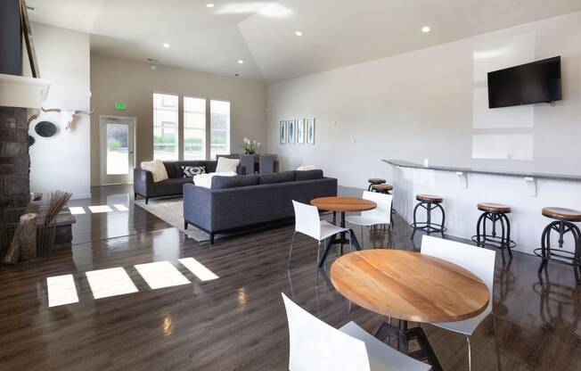 a living room filled with furniture and a fire place