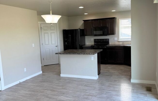 4-Bedroom Home with 3-Car Garage