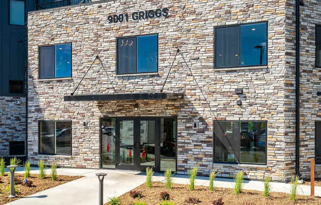 the front of our grocers building with a glass door. Circle Pines, MN Lexington Lofts