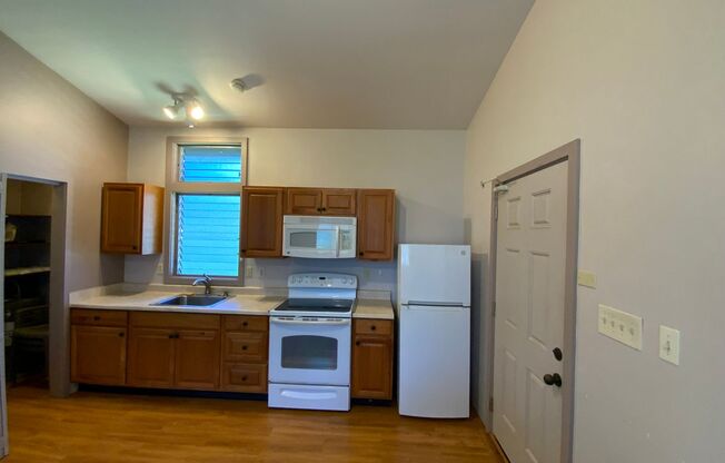 FULLY FURNISHED KAIMUKI 1 BEDROOM UNIT TUCKED AWAY IN BACK OF PROPERTY