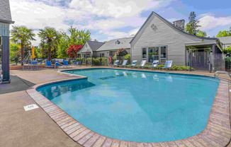 Relax by the sparkling pool at Chase Village.