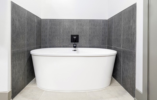 Indulge in luxury at Modera Riverview with serene bathrooms boasting spa-like soaking tubs.