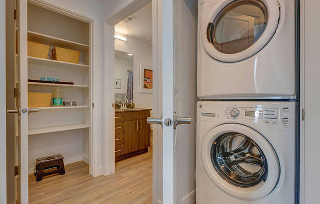 Front load washer/dryer in laundry area and closet