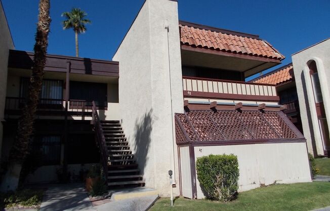 Charming Upstairs Condo with Private Balcony