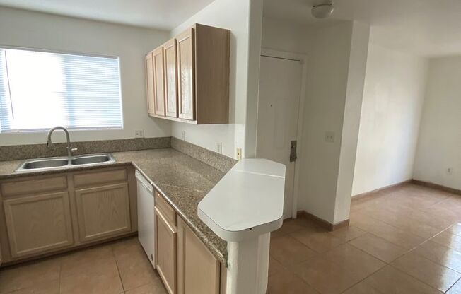 AMERICANA Property Mgmt - Downstairs 2 beds Condo near NLV airport