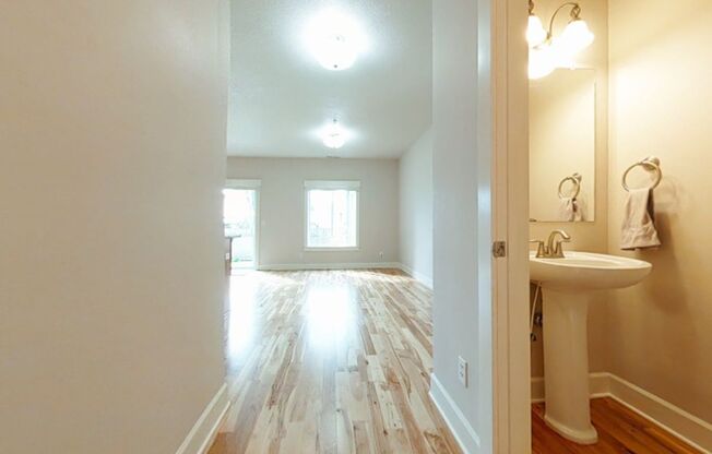 Beautiful 3 Bedroom, 2.5 Bathroom Updated Townhome with Hardwood Floors & Open Floor Plan