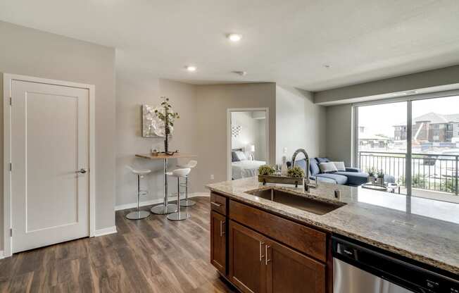 Cherry design scheme with darker cabinetry at Ascend at Woodbury new luxury apartments in Woodbury MN 55129