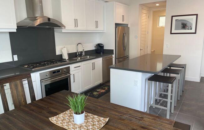 Water views! Less than a block from the ocean! 2 Bed 2.5 Bath Townhome!