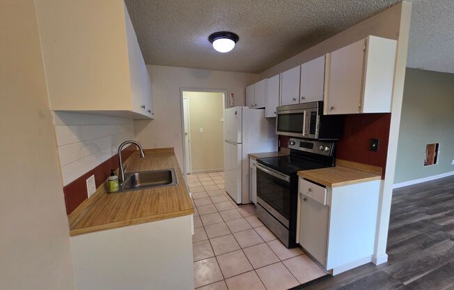 ADORABLE CENTRALLY LOCATED CONDO