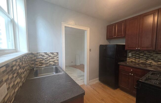 2232-48 W. Farwell / 6907-11 N. Oakley