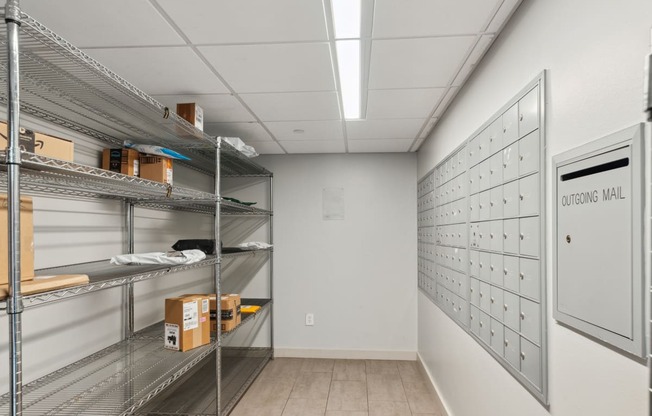 a room with lockers and boxes on the shelves