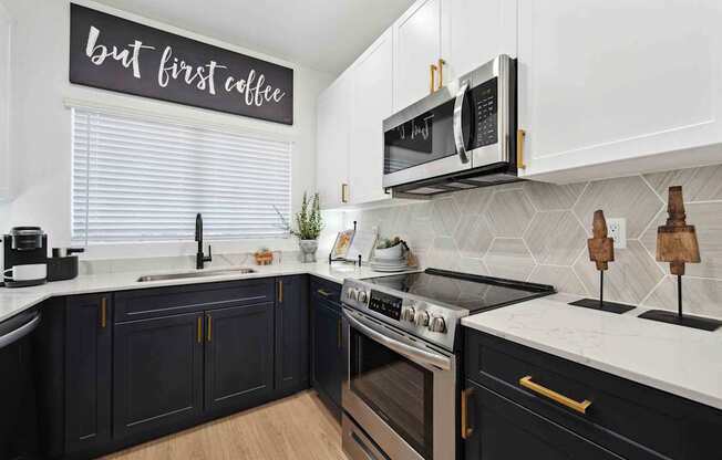 A kitchen with a sign that says