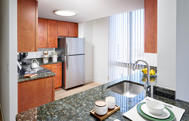 Bright and bold. Our Sterling kitchen updates include designer lighting and premium stainless steel appliances.