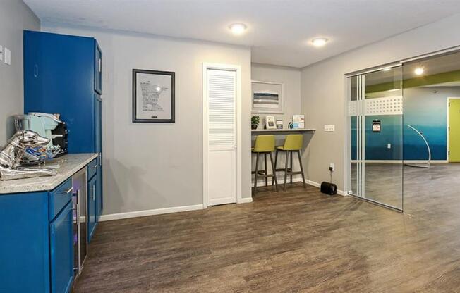 Clubhouse interior with white and blue wall colors at Twelve 501 Apartment Homes, Burnsville, MN