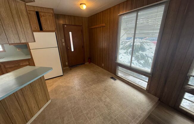 On a Cul de sac, SE Spacious 2 Bdrm, 2 Bath Mobile home w/Luxury Vinyl Floors Throughout,  Oversized Dbl Garage