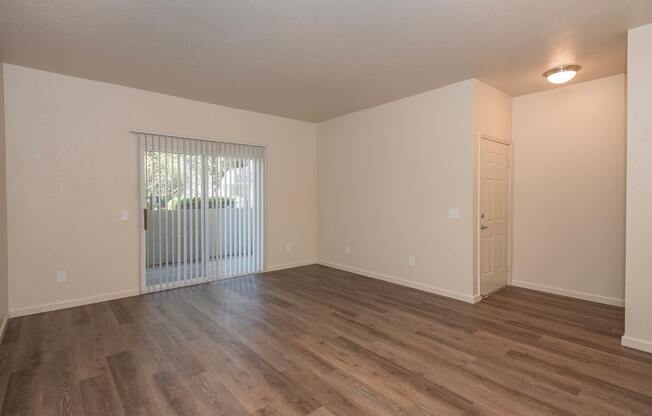 A room with wooden flooring and a window with blinds at Sunset Summit, Rocklin, CA, 95765