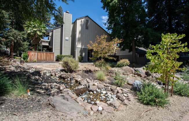 building at selby ranch with small water feature in the foreground