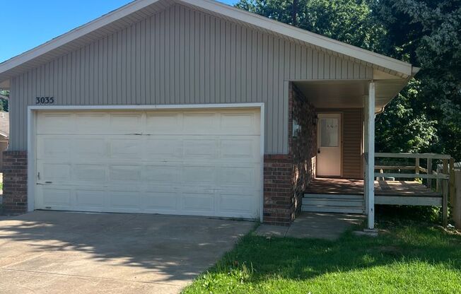 DUPLEX 2 bedroom 1.5 bath 2 car garage available now!