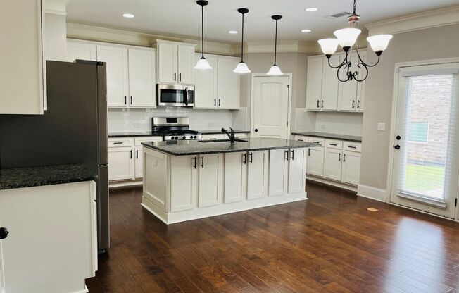 WOW! 5 bed, 4 full baths, brick exterior, custom & luxurious kitchen w/stainless appliances, subway tile, must see!