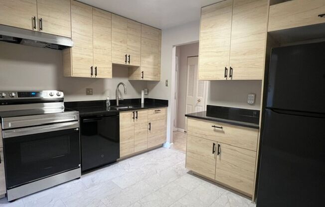 Beautiful and spacious 2 BR 2FB condo in gated community