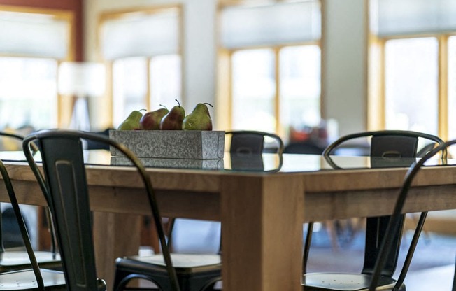 Table and seating at clubhouse at Fountain Glen Apartments