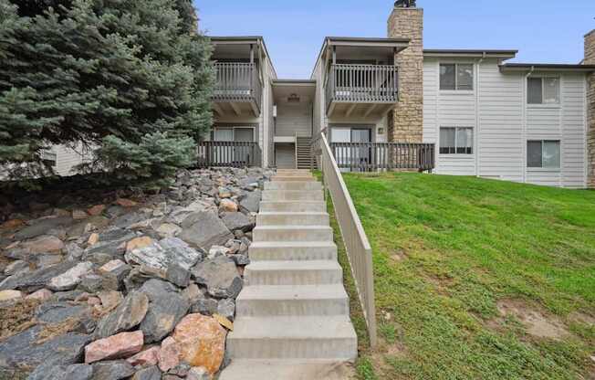 Reflections of Cherry Creek in Aurora, CO stairs leading up to the exteriors of the apartment buildings