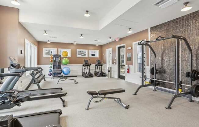 a 24-hour fitness center with cardio and weight machines