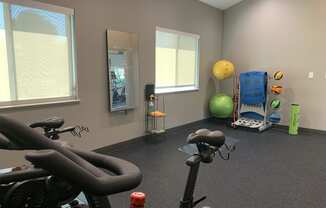 24 hour fitness center with yoga and spin studio at the northbrook apartments in lincoln nebraska