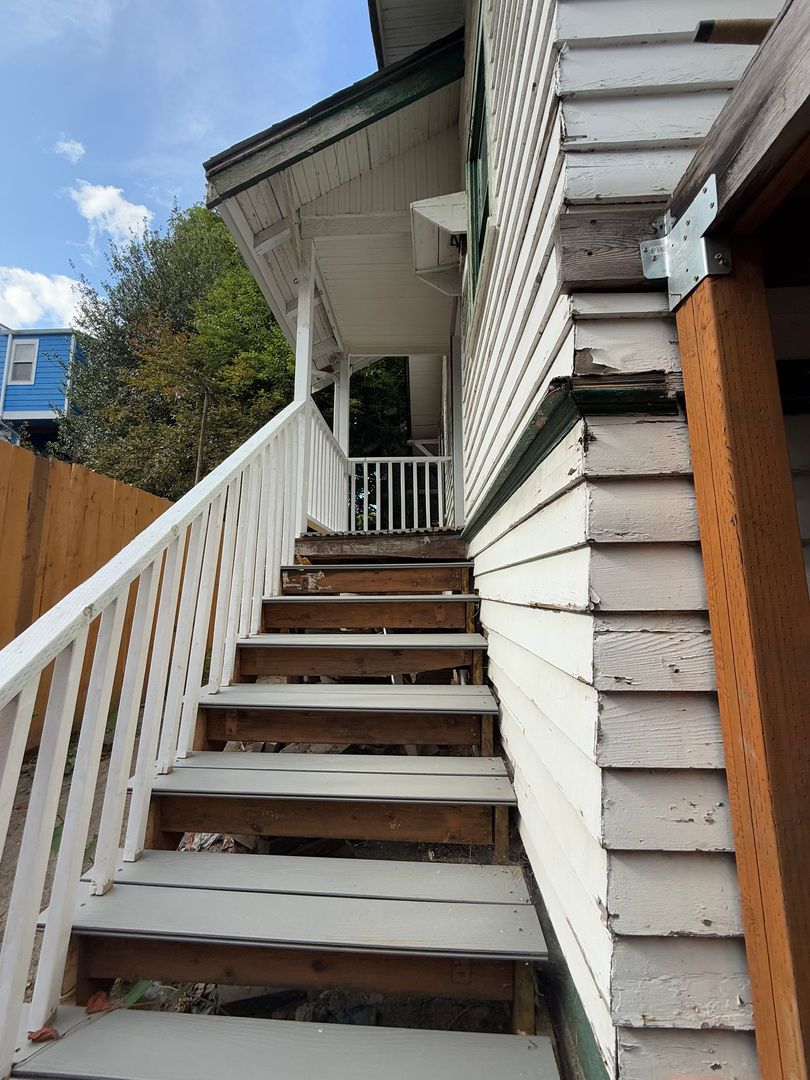 Completely renovated, university district, 2 bed, 2 bath.  hardwoods, bus line, walking to everything basement garage ample storage sliding barn door, beautifully renovated bathrooms, small yard,1 car garage. close to greenlake, Must see