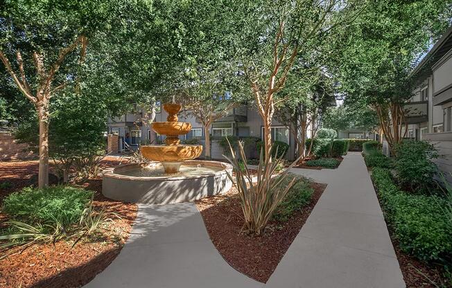a tree in front of a house