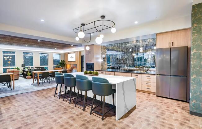 A vibrant lounge with space to gather and a kitchen perfect for cooking demos.