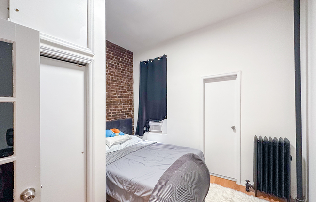 213 E 5 ST